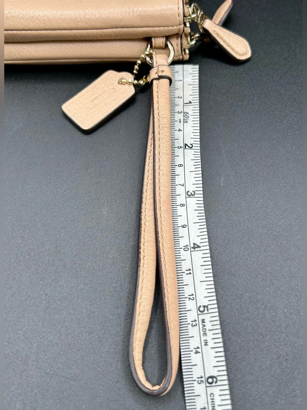 COACH Pebble Leather Double - Zip Wristlet in a neutral tan - Gold-Tone Hardware